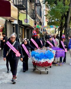 2025-exhibits - Emotional Baggage Cart Parade NYC AiOP 2024 x